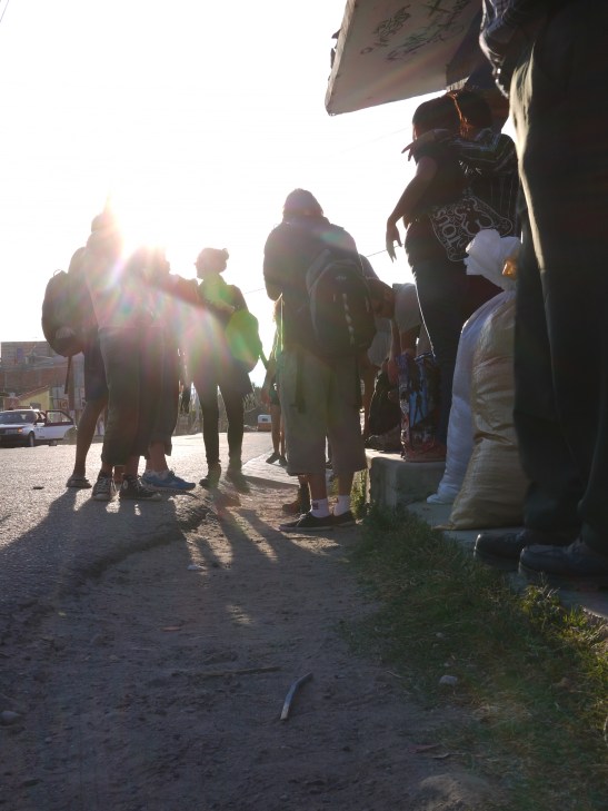 Waiting for a bus in Mitlan.